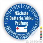Prüfetiketten, Prüfplakette rund, Farbe- Blau, Text "Nächste Batterie/Akku Prüfung" in Weiß. Icon Batterie, Startjahr- 25, Monatszahlen Oben und Jahreszahlen Unten in Kreisform.