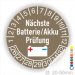 Prüfetiketten, Prüfplakette rund, Farbe- Braun, Text "Nächste Batterie/Akku Prüfung" in Weiß. Icon Batterie, Startjahr- 25, Monatszahlen Oben und Jahreszahlen Unten in Kreisform.