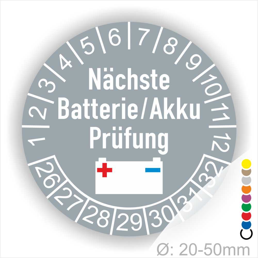 Prüfetiketten, Prüfplakette rund, Farbe- Grau, Text "Nächste Batterie/Akku Prüfung" in Weiß. Icon Batterie, Startjahr- 25, Monatszahlen Oben und Jahreszahlen Unten in Kreisform.