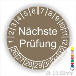Prüfplaketten, Prüfetiketten rund, Farbe- Braun, Text "Nächste Prüfung" in Weiß. Startjahr- 25, Monatszahlen Oben und Jahreszahlen Unten in Kreisform.