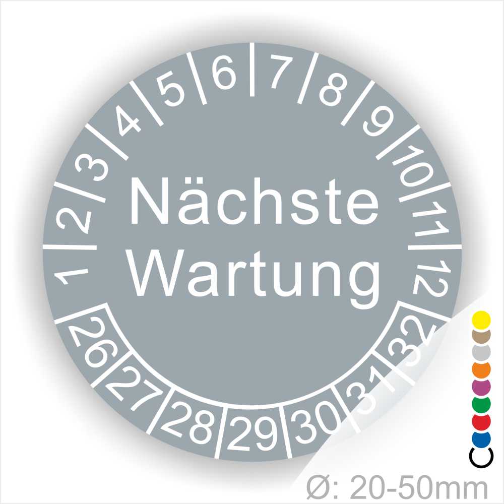Prüfplaketten, Prüfetiketten rund, Farbe- Grau, Text "Nächste Wartung" in Weiß. Startjahr- 26, Monatszahlen Oben und Jahreszahlen Unten in Kreisform.