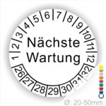 Prüfplaketten, Prüfetiketten rund, Farbe- Weiß, Text "Nächste Wartung" in Schwarz. Startjahr- 26, Monatszahlen Oben und Jahreszahlen Unten in Kreisform.