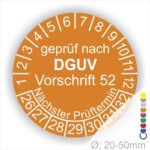 Prüfzertifikat nach DGUV Vorschrift 52, orangefarbener Prüfaufkleber mit nächstem Prüftermin und Durchmesserangabe von 20-50 mm.
