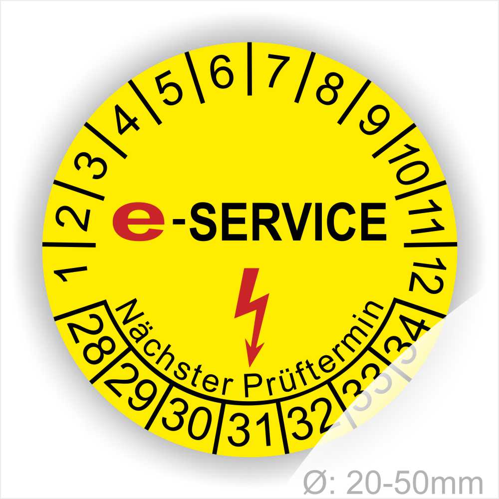 Prüfplaketten rund, Farbe- Gelb, Text "E-SERVICE" in Schwarz danach ein Elektro- Pfeil in Rot, Startjahr- 28, Monatszahlen Oben und Jahreszahlen Unten in Kreisform. Über den Jahreszahlen Text "Nächster Prüftermin"