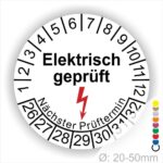 Prüfplaketten rund, Text "Elektrisch geprüft" Farbe- Weiß Startjahr- 26 mit Elektro Pfeil in Rot, Monatszahlen Oben und Jahreszahlen Unten in Kreisform