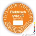 Pruefplakette mit Text Elektrisch geprüft gemäß Paragrapf als Zeichen und Beschriftungfeld zum eintragen des Paragraphs Farbe- Orange Startjahr- 26 mit Monatszahlen Oben und Jahreszahlen Unten Form ist Rund