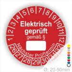 Pruefplakette mit Text Elektrisch geprüft gemäß Paragrapf als Zeichen und Beschriftungfeld zum eintragen des Paragraphs Farbe- Rot Startjahr- 26 mit Monatszahlen Oben und Jahreszahlen Unten Form ist Rund