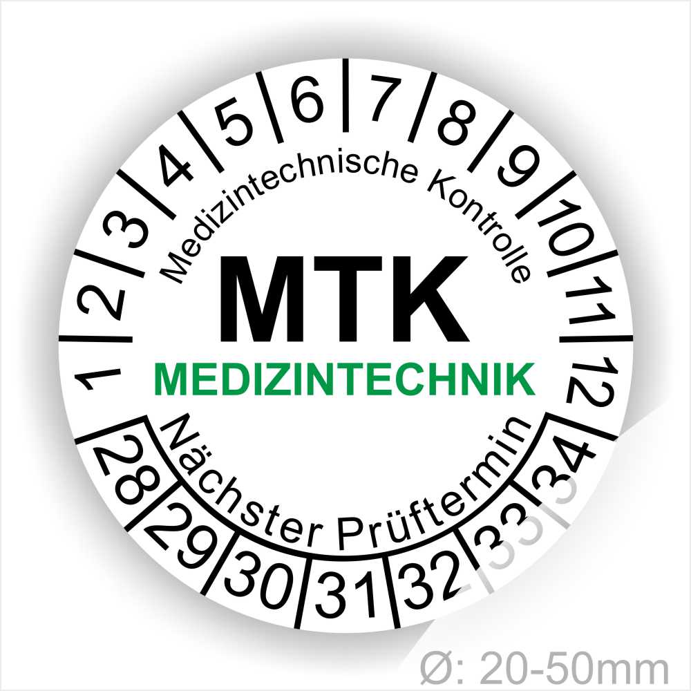 Prüfplakette MTK Medizintechnik Prüfetiketten rund, Farbe- Weiß, Text "Medizintechnische Kontrolle, MTK MEDIZINTECHNIK Nächster Prüftermin" in Schwarz. Startjahr- 28, Monatszahlen Oben und Jahreszahlen Unten in Kreisform. über den Jahreszahlen Text.