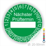 Prüfplakette, Prüfetikett rund, Farbe- Grün, Text "Nächster Prüftermin" in Weiß. Als nächstes kommt ein Beschriftungfeld / Leerfeld in Farbe Weiß. Startjahr- 26, Monatszahlen Oben und Jahreszahlen Unten in Kreisform.