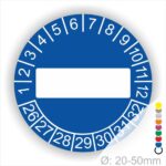 Prüfplaketten, Prüfetikett rund, Farbe- Blau, Text " in Weiß. Als nächstes kommt ein Beschriftungfeld / Leerfeld in Farbe Weiß. Startjahr- 26, Monatszahlen Oben und Jahreszahlen Unten in Kreisform.