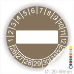 Prüfplaketten, Prüfetikett rund, Farbe- Braun, Text " in Weiß. Als nächstes kommt ein Beschriftungfeld / Leerfeld in Farbe Weiß. Startjahr- 26, Monatszahlen Oben und Jahreszahlen Unten in Kreisform.