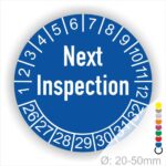 Prüfetiketten, Prüfaukleber rund, Farbe- Blau, Text auf Englisch "Next Inspection" in Weiß. Startjahr- 26, Monatszahlen Oben und Jahreszahlen Unten in Kreisform.