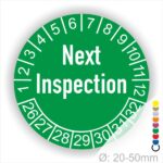 Prüfplaketten, Prüfetiketten rund, Farbe- Grün, Text auf Englisch "Next Inspection" in Weiß. Startjahr- 26, Monatszahlen Oben und Jahreszahlen Unten in Kreisform.