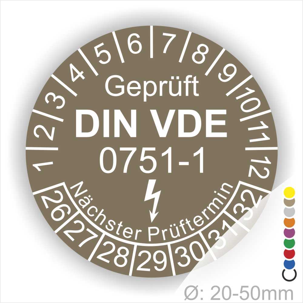 Prüfplaketten rund, Farbe- Braun, Text "Geprüft gemäß DIN VDE 0751-1" in Weiß danach ein Elektro- Pfeil in Weiß, Startjahr- 26, Monatszahlen Oben und Jahreszahlen Unten in Kreisform. Über den Jahreszahlen Text "Nächster Prüftermin"