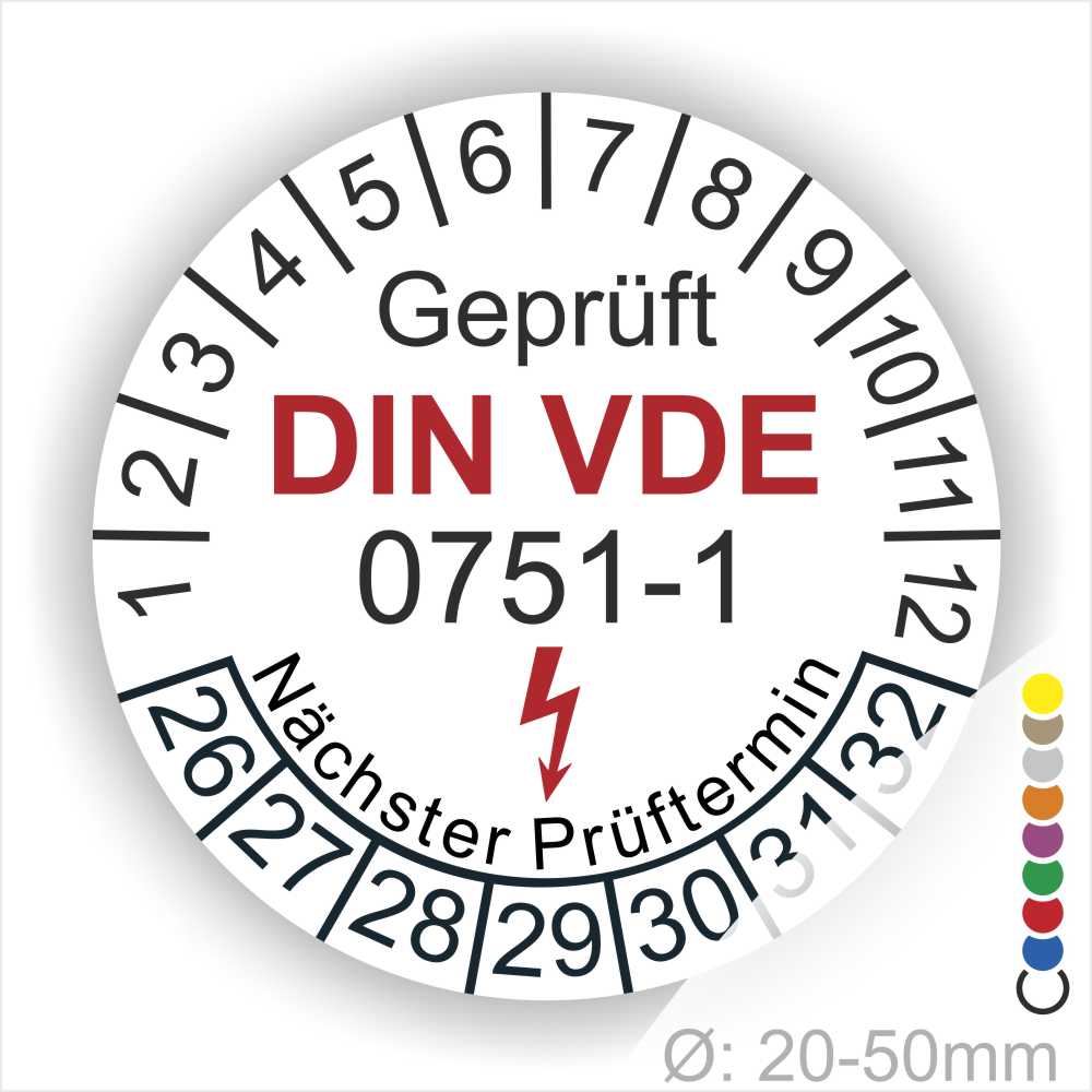 Prüfplaketten rund, Farbe- Weiß, Text "Geprüft gemäß DIN VDE 0751-1" in Schwarz danach ein Elektro- Pfeil in Rot, Startjahr- 26, Monatszahlen Oben und Jahreszahlen Unten in Kreisform. Über den Jahreszahlen Text "Nächster Prüftermin"