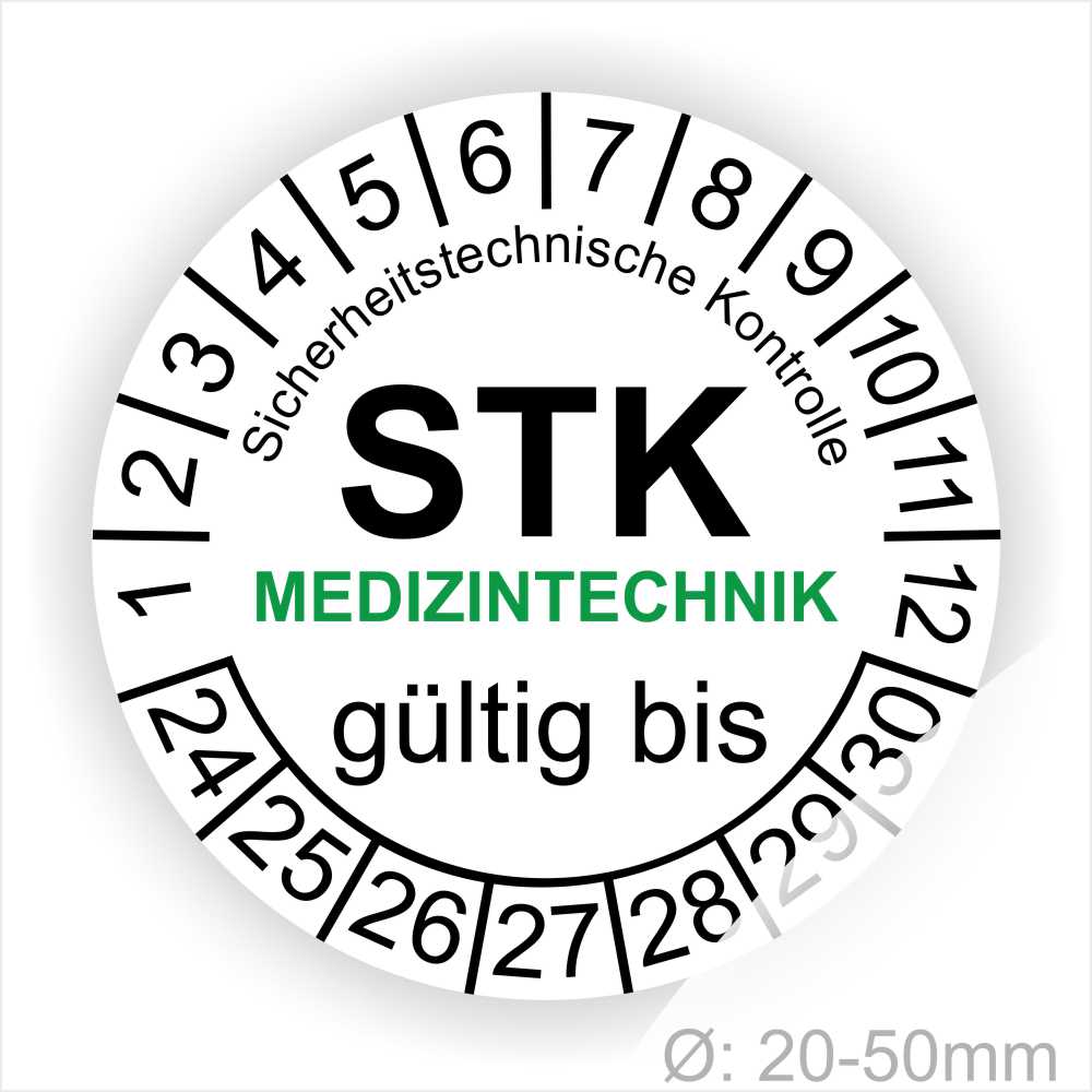 Prüfetiketten rund, Farbe- Weiß, Text "Sicherheitstechnische Kontrolle, STK MEDIZINTECHNIK gültig bis" in Schwarz. Startjahr- 24, Monatszahlen Oben und Jahreszahlen Unten in Kreisform. über den Jahreszahlen Text.