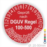 Prüfplakette rund mit Text geprüft nach DGUV Regel 100-500 Nächster Prüftermin. Plaketten Farbe- Rot und Text in Weiß. Monatszahlen oben und Jahreszahlen unten beginnend mit Startjahr- 26. Durchmesser 20-50mm frei wählbar.
