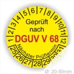 Prüfplakette rund mit Text geprüft nach Dguv Vorschrift 68 danach Nächster Prüftermin. Plaketten Farbe- Gelb und Text in Schwarz . Monatszahlen oben und Jahreszahlen unten beginnend mit Startjahr- 25. Für Prüfungen von Flurförderzeuge