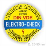 Elektro-Check Prüfplakette rund, Farbe- Gelb in der Mitte ein Streifen in Blau, Text oberer Teil "Geprüft gemäß DIN-VDE" in Schwarz. Mittig Streifen in Rot mit dem Text " ELEKTRO-CHECK", danach Elektropfeil in Rot Startjahr- 26,