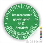 Grünes Prüfzeichen für Brandschutztüren, das die Konformität gemäß §4 (3) ArbStättV bestätigt. Enthält Informationen zum nächsten Prüftermin und ist für Türen mit einem Durchmesser von 20-50 mm geeignet.