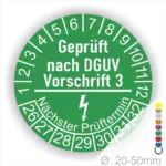Grüne Prüfplakette mit Aufschrift "Geprüft nach DGUV Vorschrift 3", zeigt den nächsten Prüftermin und ist für Durchmesser von 20-50 mm geeignet.