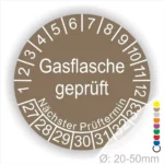 Runder Aufkleber zur Kennzeichnung geprüfter Gasflaschen mit dem Hinweis "Gasflasche geprüft" und Angaben zum nächsten Prüftermin, geeignet für Flaschen mit einem Durchmesser von 20-50 mm.