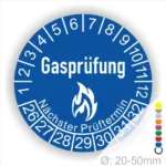 Blaues Gasprüfungslabel mit dem Text "Gasprüfung" und "Nächster Prüftermin" Kennzeichnung der nächsten Gasprüfung mit Feuer-Icon und Zahlen von 1 bis 12 Monatszahlen und 26-32 Jahreszahlen. Ideal für die Sicherheit von Gasinstallationen. Durchmesser 20-50 mm.