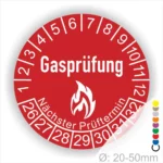Rotes Gasprüfungslabel mit dem Text "Gasprüfung" und "Nächster Prüftermin" Kennzeichnung der nächsten Gasprüfung mit Feuer-Icon und Zahlen von 1 bis 12 Monatszahlen und 26-32 Jahreszahlen. Ideal für die Sicherheit von Gasinstallationen. Durchmesser 20-50 mm.
