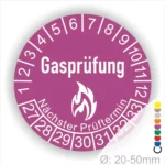 Runder Aufkleber für Gasprüfungen mit der Aufschrift "Gasprüfung" und dem Hinweis auf den nächsten Prüftermin. Die Skala zeigt die Monate von 1 bis 12 und die Tage von 1 bis 31. Farbige Markierungen zur Kennzeichnung. Durchmesser von 20-50 mm.