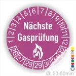 Runder Aufkleber für die nächste Gasprüfung mit Zahlen von 1 bis 32 und Flammensymbol, Durchmesser 20-50 mm, in lila.