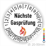 Runder Aufkleber zur Kennzeichnung der nächsten Gasprüfung mit Feuer-Icon und Zahlen von 1 bis 32. Ideal für die Sicherheit von Gasinstallationen. Durchmesser 20-50 mm.