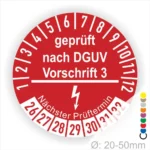 Roter Prüfaufkleber mit dem Text "geprüft nach DGUV Vorschrift 3", zeigt die nächsten Prüftermine von 1 bis 12 sowie die Möglichkeit zur Farbcodierung. Geeignet für Geräte mit einem Durchmesser von 20 bis 50 mm.