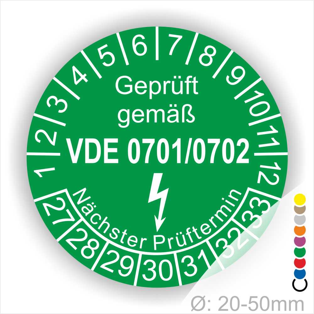Grünes Prüfzeichen mit der Aufschrift „Geprüft gemäß VDE 0701/0702“, das den nächsten Prüftermin anzeigt. Das Symbol weist auf die Sicherheit von elektrischen Geräten hin und ist für Geräte mit einem Durchmesser von 20-50 mm geeignet.
