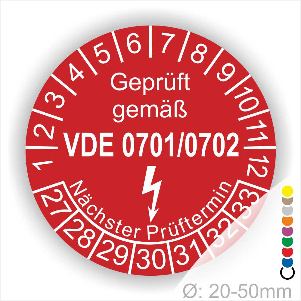 Rotes Prüfzeichen mit der Aufschrift "Geprüft gemäß VDE 0701/0702", das den nächsten Prüftermin anzeigt. Durchmesser: 20-50 mm. Ideal für die Kennzeichnung von elektrischen Geräten und Sicherheitsprüfungen.