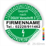 Grünes Prüfzeichen nach DGUV Vorschrift 3 mit Platz für Firmenname und Telefonnummer, Durchmesser zwischen 25-50 mm.