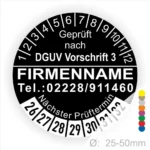 Alt-Text: Rundes Prüfplakett, geprüft nach DGUV Vorschrift 3, mit Platz für Firmenname und Kontaktnummer, zeigt nächsten Prüftermin und hat einen Durchmesser von 25-50 mm.