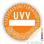 Oranges UVV-Prüfzeichen mit Platz für das nächste Prüfdatum, um die Sicherheitsüberprüfung von Geräten und Maschinen zu kennzeichnen. Durchmesser von 20-50 mm, wichtig für die Einhaltung von Sicherheitsvorschriften.