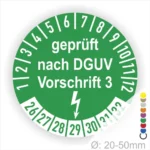 Grünes Prüfzeichen nach DGUV Vorschrift 3, Durchmesser 20-50mm, mit Zahlen von 1 bis 12 und Sicherheitsblitzsymbol, zur Kennzeichnung geprüfter Geräte.