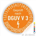 Prüfsiegel DGUV V3 auf orangefarbener Plakette mit Zahlen von 1 bis 30 und Symbol für elektrische Sicherheit; geeignet für Durchmesser von 20-50 mm.