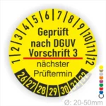 Prüfplakette mit Text Geprüft nach Dguv Vorschrift 3 und Nächster Prüftermin mit zwischen Strich in Rot. Plaketten Farbe- Gelb und Text in Schwarz. Monatszahlen oben und Jahreszahlen unten beginnend mit Startjahr- 26