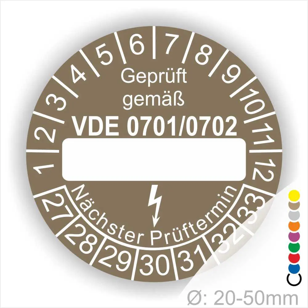 Prüfaufkleber gemäß VDE 0701/0702 zur Kennzeichnung von elektrischen Geräten, mit Platz für das nächste Prüfdatum und einem Durchmesser von 20-50 mm.
