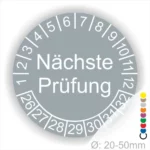 Runde Prüfplakette mit der Aufschrift "Nächste Prüfung" und Zahlen von 1 bis 32, Durchmesser 20-50 mm, geeignet für die Kennzeichnung von Prüfterminen.