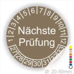Prüfplaketten, Prüfetiketten rund, Farbe- braun, Text "Nächste Prüfung" in weiß. Startjahr- 27, Monatszahlen Oben und Jahreszahlen Unten in Kreisform.