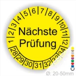 Wartungsplakette, Prüfetiketten rund, Farbe- gelb, Text "Nächste Prüfung" in schwarz. Startjahr- 28, Monatszahlen Oben und Jahreszahlen Unten in Kreisform.