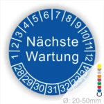 Blaue Wartungsscheibe mit der Aufschrift "Nächste Wartung" und nummerischen Markierungen von 1 bis 34, geeignet für Durchmesser von 20-50 mm.