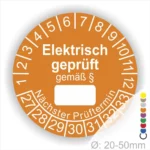 Runde Prüfplakette für elektrische Geräte, orange mit der Aufschrift "Elektrisch geprüft gemäß §". Enthält Platz für das Prüfdatenfeld und die nächsten Prüftermine. Durchmesser von 20-50 mm.