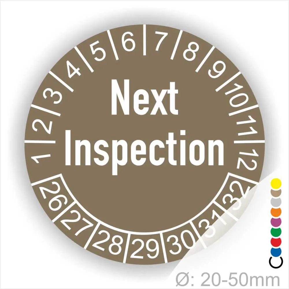 Prüfplaketten, Prüfaufkleber rund, Farbe- grau, Text auf Englisch "Next Inspection" in Weiss. Startjahr- 26, Monatszahlen Oben und Jahreszahlen Unten in Kreisform.