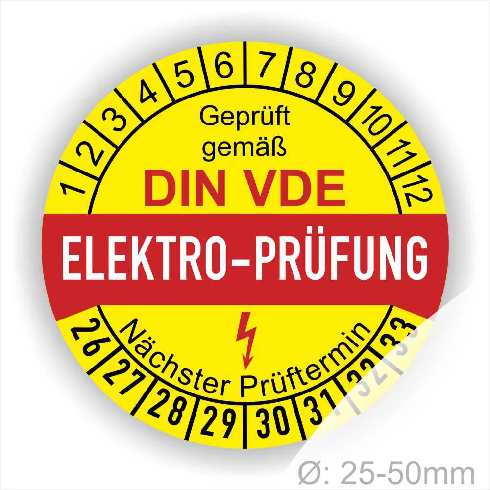 Elektro-Prüfplakette gemäß DIN VDE mit Angaben zum nächsten Prüftermin und einem Durchmesser von 25-50 mm. Die Plakette zeigt eine farbige Markierung zur Kennzeichnung der Prüfung.