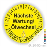 Prüfetiketten, Wartungsplakette rund, Farbe- Gelb, Text "Nächste Wartung/Ölwechsel" in schwarz. Startjahr- 29, Monatszahlen Oben und Jahreszahlen Unten in Kreisform, über den Jahreszahlen ein Öltropfen als Icon/Piktogramm in Gelb.
