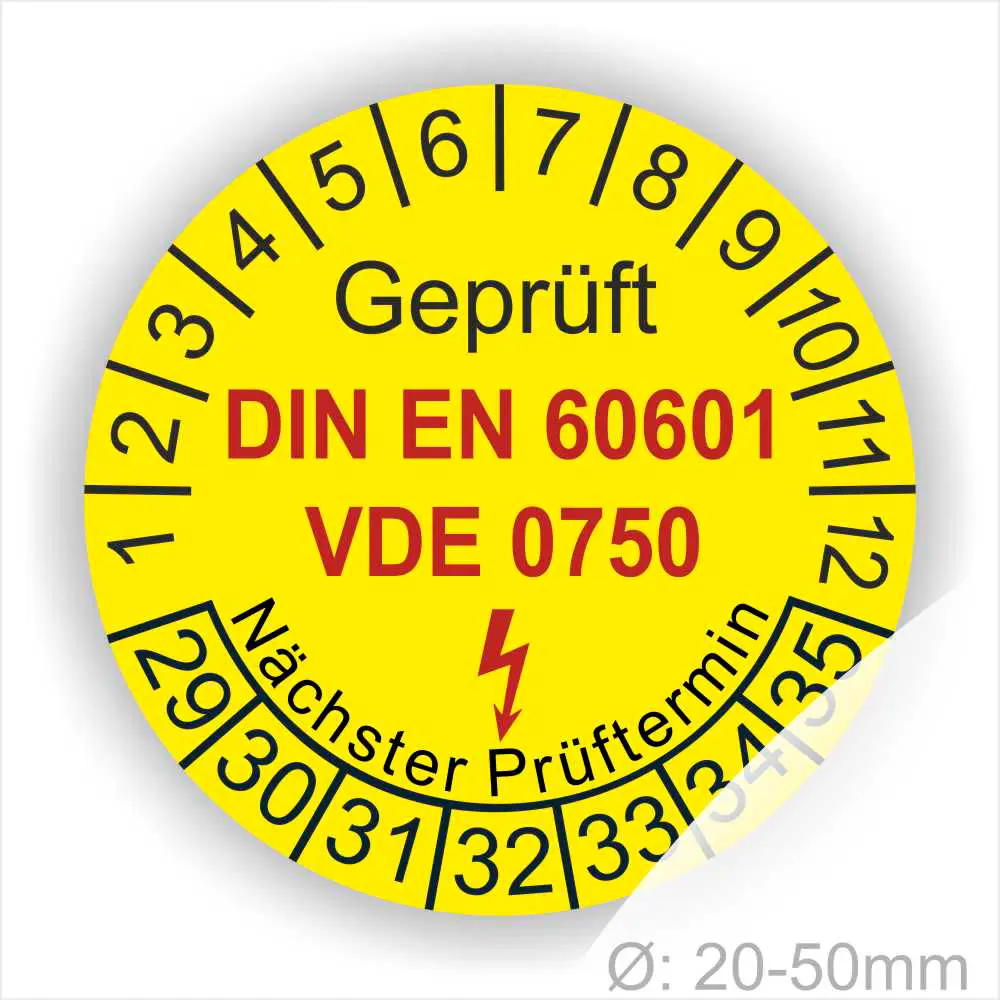 Gelbes Prüfzeichen mit den Normen DIN EN 60601 und VDE 0750, das den nächsten Prüftermin anzeigt. Durchmesser von 20-50mm, geeignet für die Kennzeichnung von elektrischen Geräten.